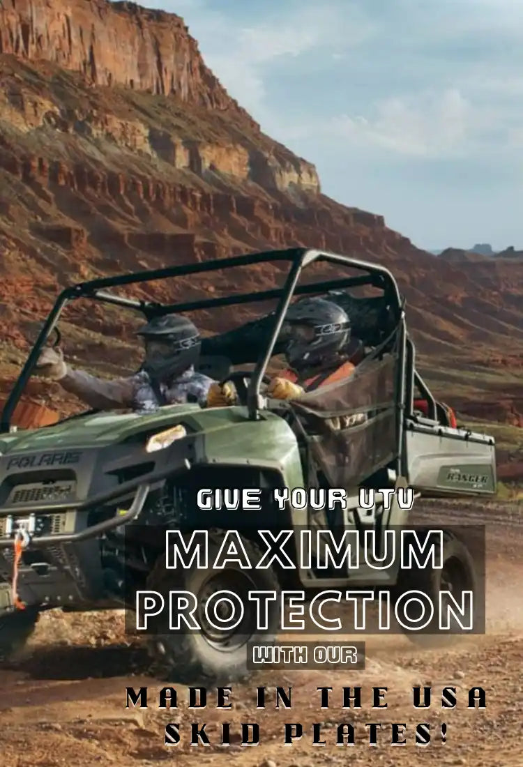 An off-road utility vehicle (UTV) with a roll cage and two occupants wearing helmets.
